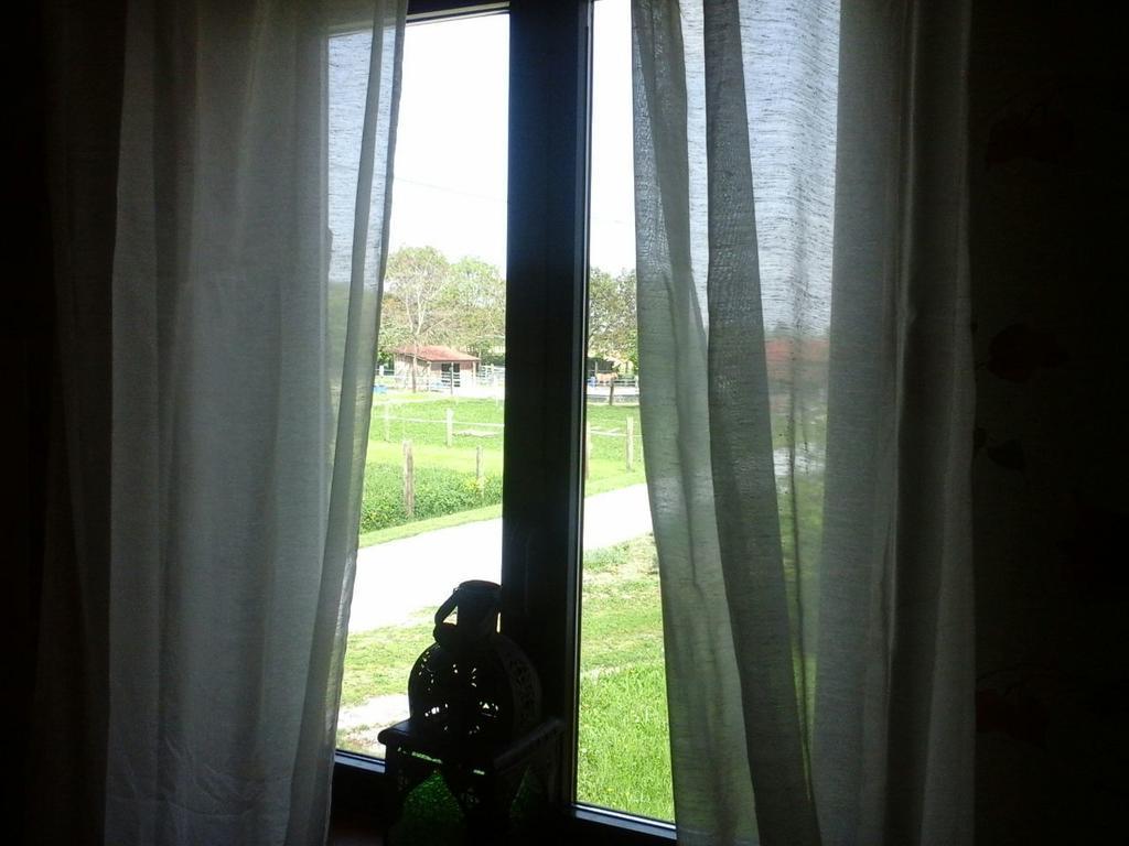 Camera Familiare con Bagno in Comune